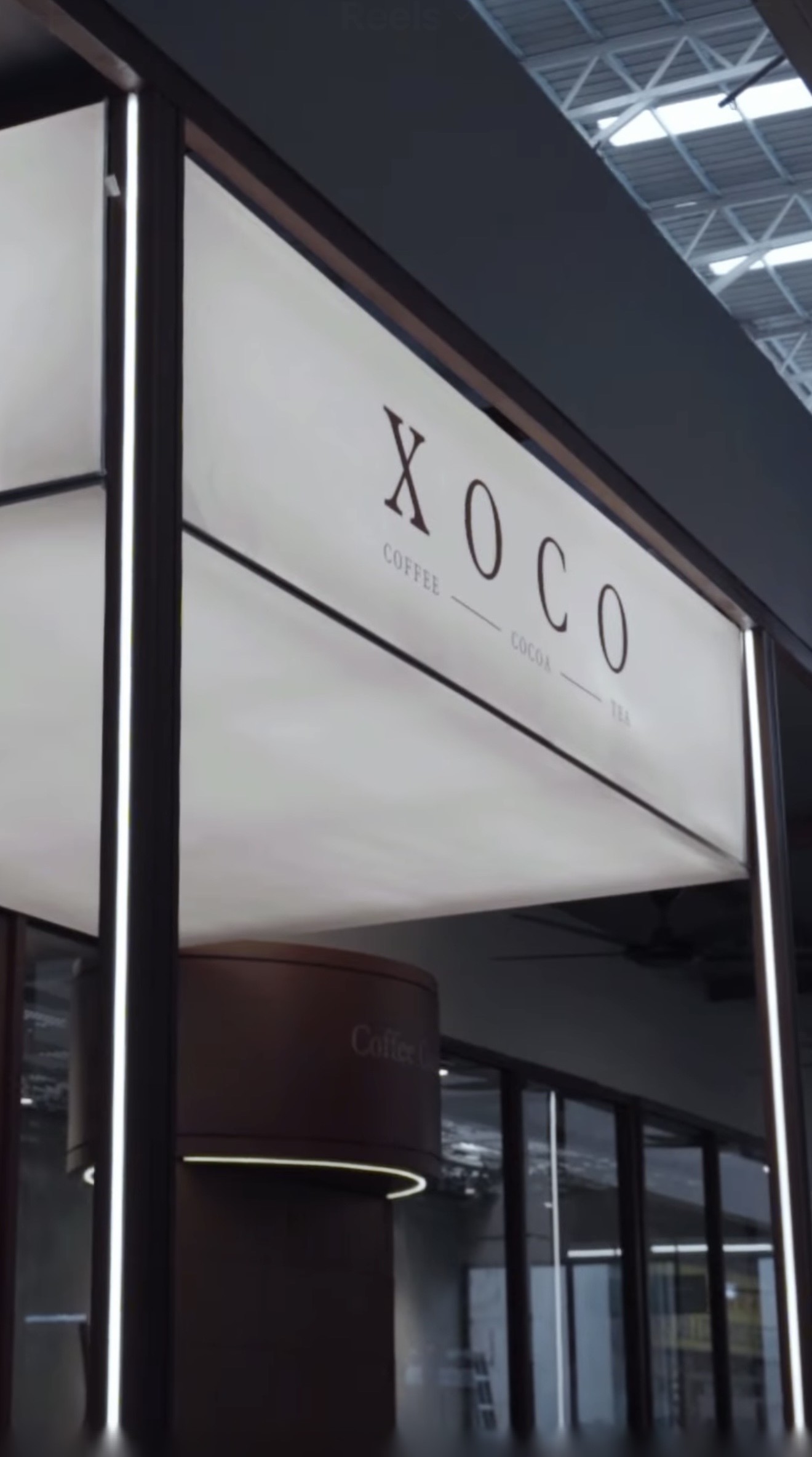 The XOCO Coffee, Cocoa & Tea storefront sign at City Mall